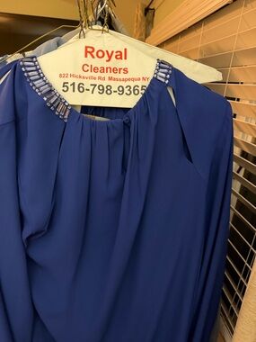 Embellished Royal Blue BCBG Top size medium 
Worn a few times.. like new